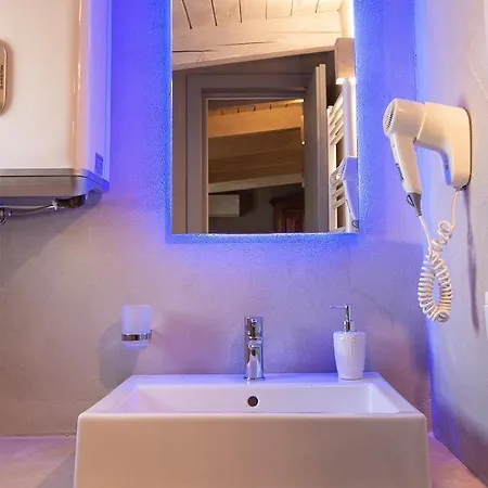 Bed & Breakfast Graffiti Living - Santa Rita - Rooms